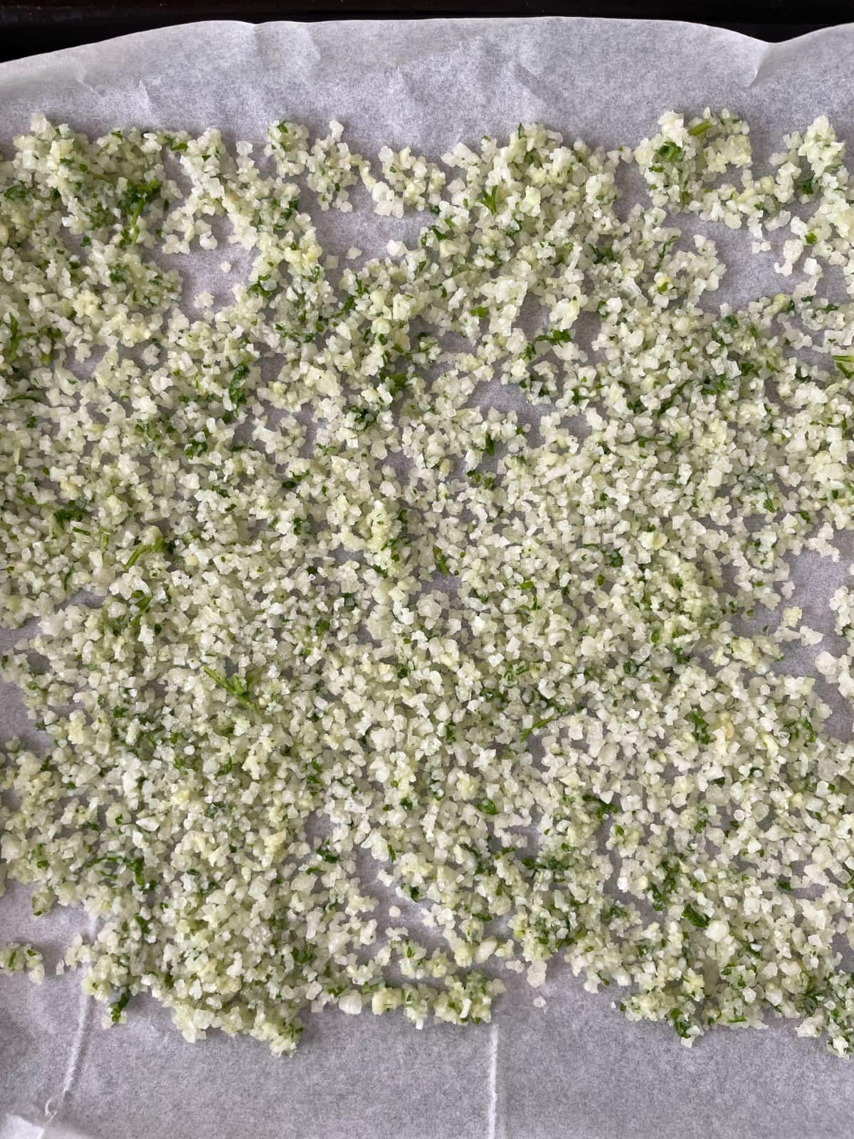 garlic parsley salt in a baking sheet