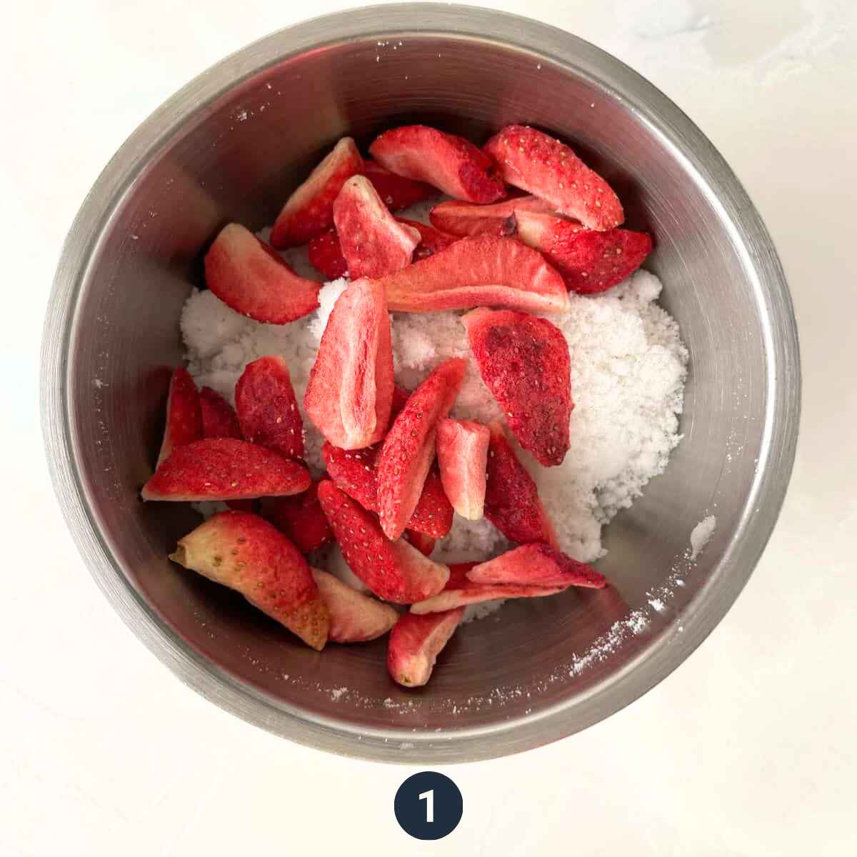 Freeze strawberry and sugar in food processor