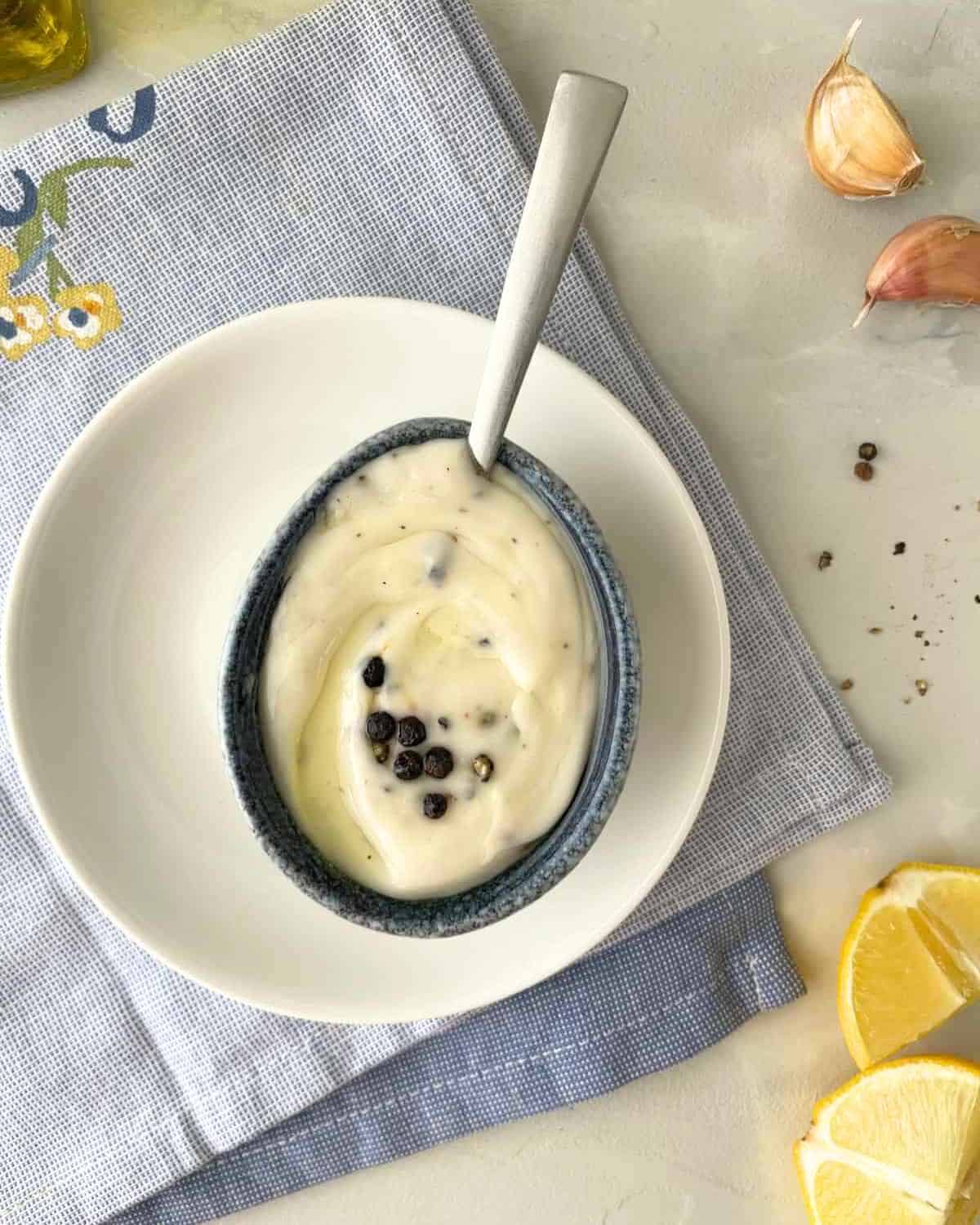 yummy Black-pepper-aioli in a bowl with a spoon