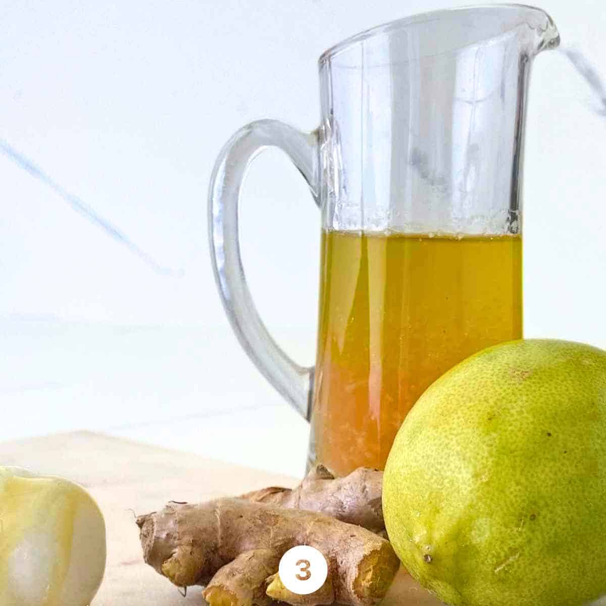 pour the Ginger Lemon Honey Syrup in a jar