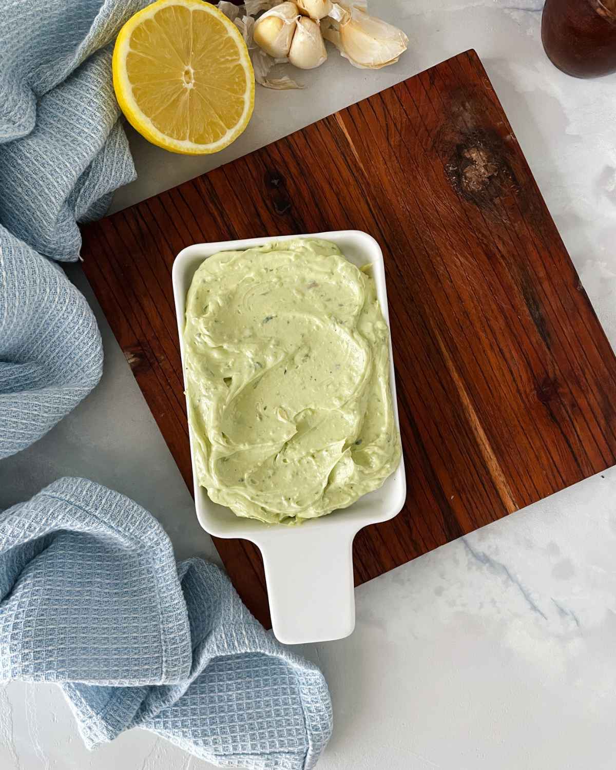 creamy avocado butter spread served in a small platter. 