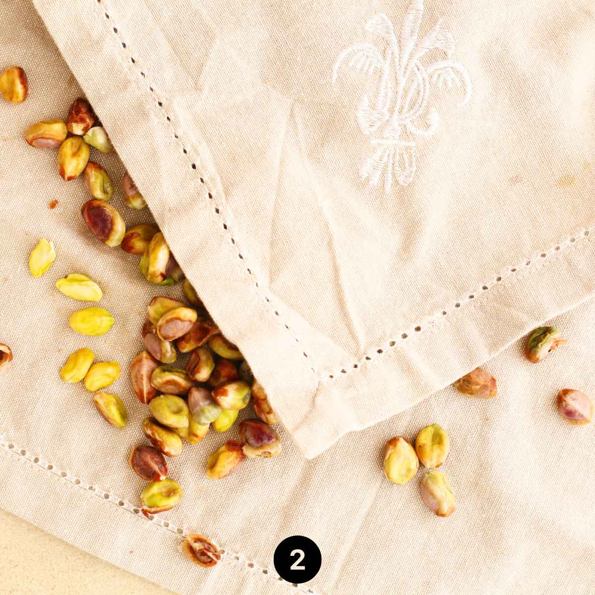 Pistachios are rubbed in a wet cloth