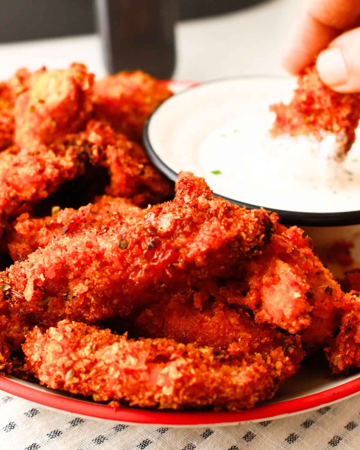 Zoom in image of Air Fried Chicken Tenders dipped in mayo sauce