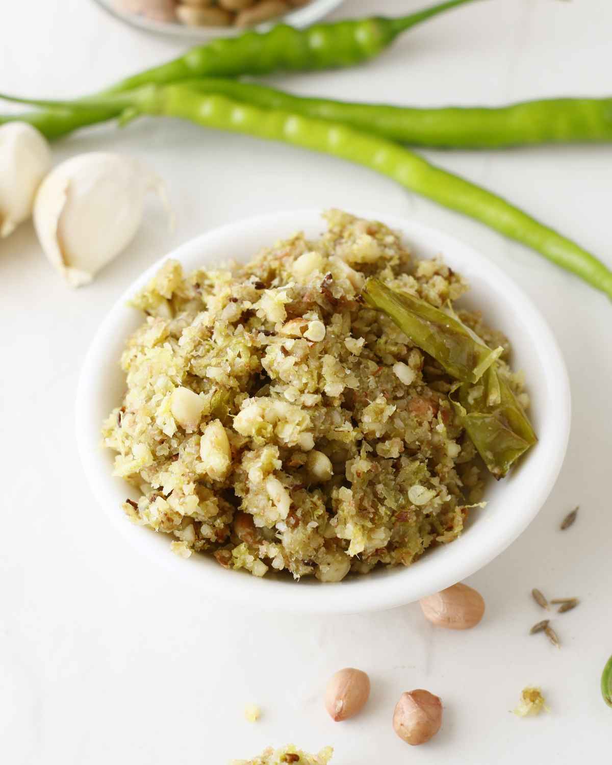 Top side view image of Green chili thecha in bowl 