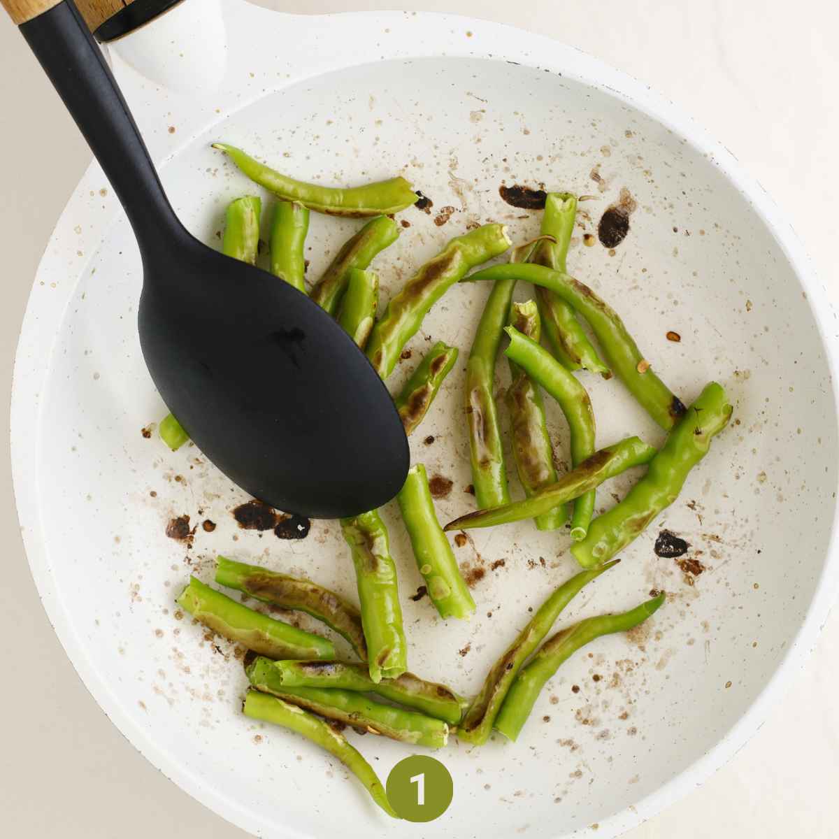 sauté the green chilies with a teaspoon of oil